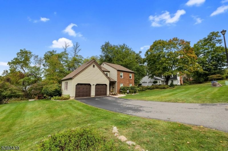 Attached, Backyard, Exterior, Facade, Brick Facade, Tudor Revival