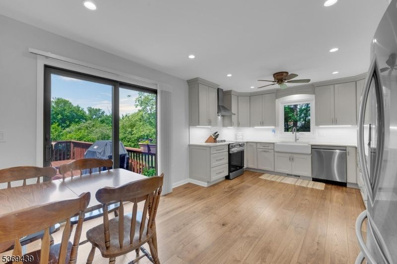 Dining room, Interior, Kitchen, Recessed Lighting, Stainless Steel Appliances, Wood Texture Flooring