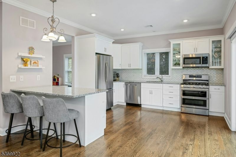 Interior, Kitchen, Pendant Lights, Recessed Lighting, Stainless Steel Appliances, Wood Texture Flooring
