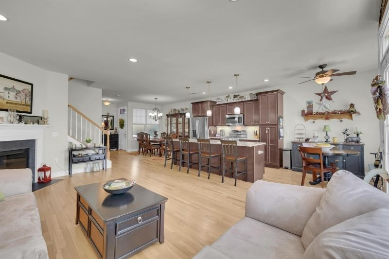 Chandelier, Dining room, Fireplace, Interior, Kitchen, Living room, Pendant Lights, Recessed Lighting, Wood Texture Flooring