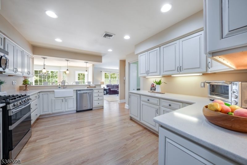 Interior, Kitchen, Pendant Lights, Recessed Lighting, Stainless Steel Appliances, Wood Texture Flooring