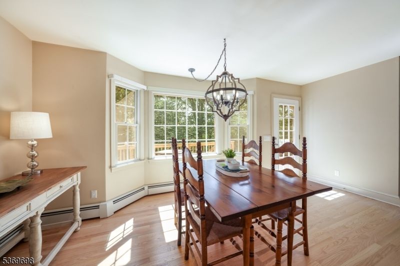 Chandelier, Dining room, Interior, Wood Texture Flooring