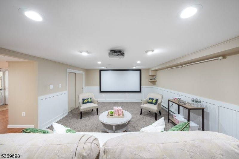 Interior, Living room, Projection Screen, Recessed Lighting, Wood Texture Flooring