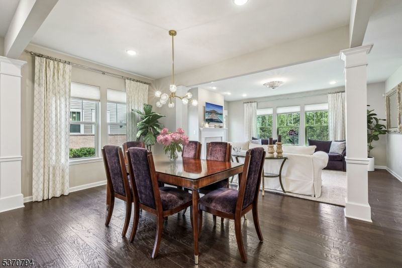 Dining room, Fireplace, Interior, Living room, Pendant Lights, Recessed Lighting, Wood Texture Flooring