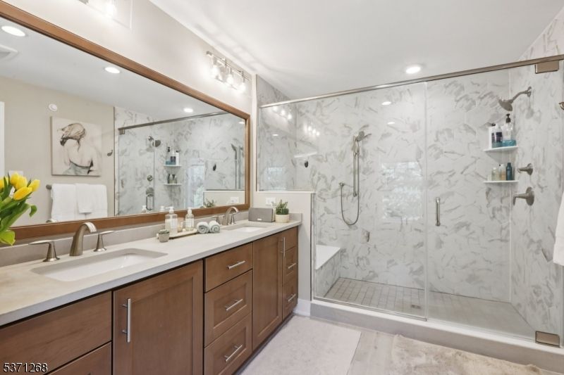 Bathroom, Dual Sink Vanities, Glass Shower, Interior, Marble Walls, Recessed Lighting