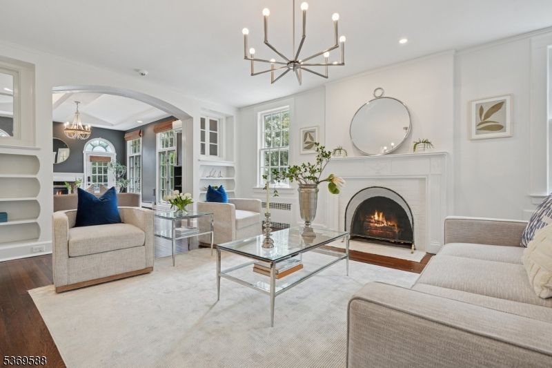 Chandelier, Fireplace, Interior, Living room, Recessed Lighting, Wood Texture Flooring