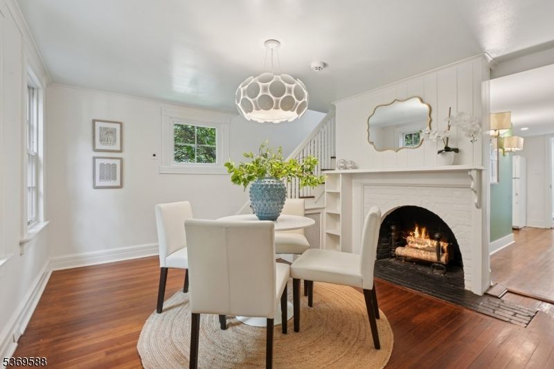 Dining room, Fireplace, Interior, Pendant Lights, Wood Texture Flooring