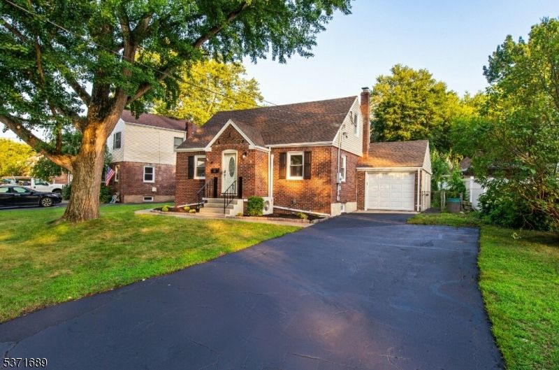 Attached, Exterior, Facade, Brick Facade, Cape Cod