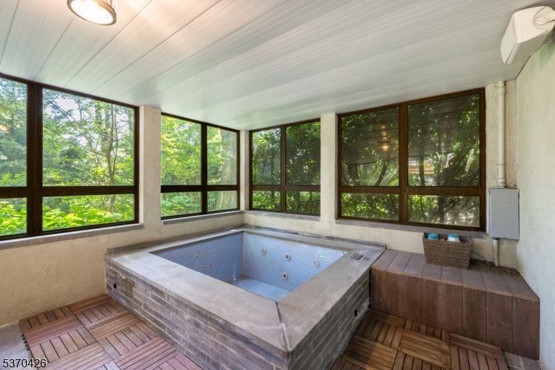 Hot Tub, Interior, Recessed Lighting, Sun Room, Wood Texture Flooring