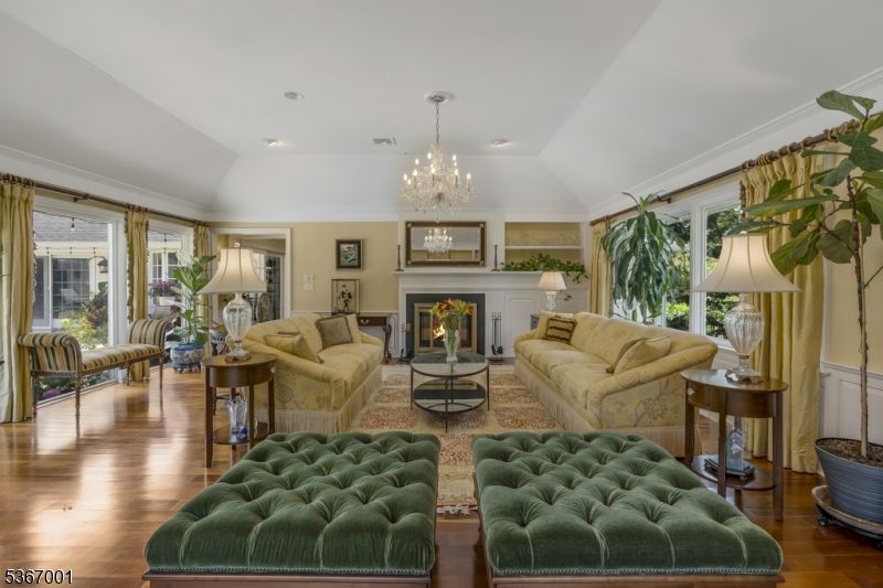 Chandelier, Fireplace, Interior, Living room, Recessed Lighting, Wood Texture Flooring