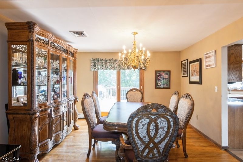 Chandelier, Dining room, Interior, Wood Texture Flooring