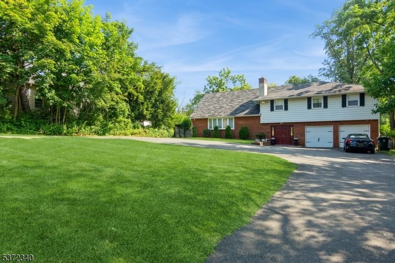 Attached, Backyard, Exterior, Facade, Brick Facade, Split Level