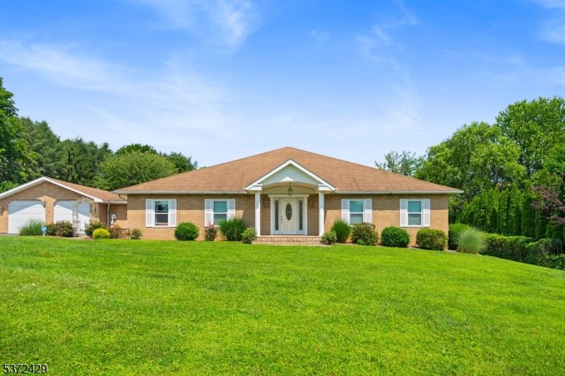 Attached, Backyard, Exterior, Facade, Brick Facade, Ranch