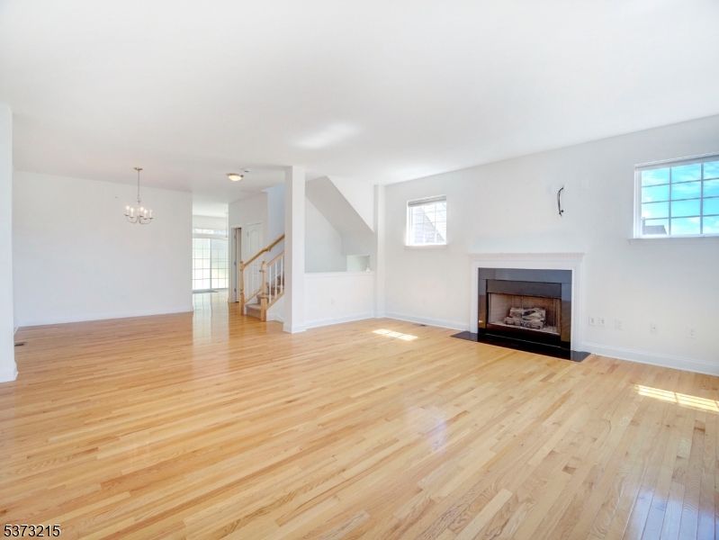 Chandelier, Empty room, Fireplace, Interior, Wood Texture Flooring