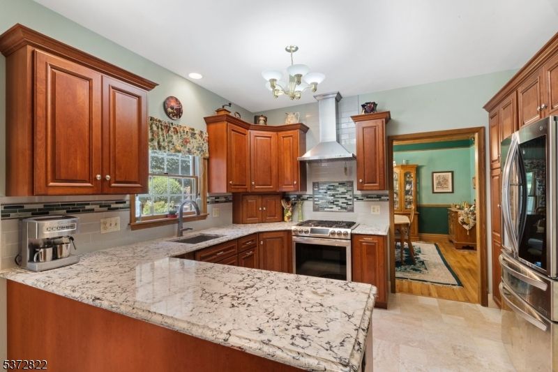 Chandelier, Interior, Kitchen, Recessed Lighting, Stainless Steel Appliances, Wood Texture Flooring