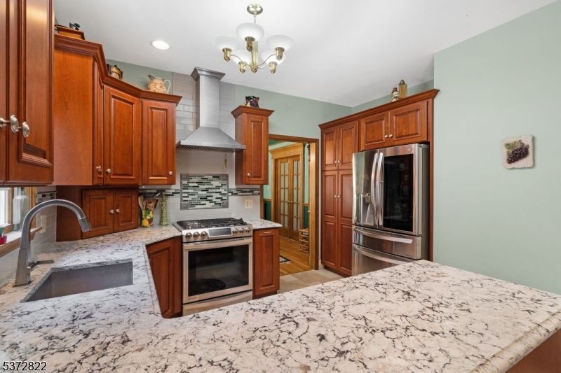 Chandelier, Interior, Kitchen, Recessed Lighting, Stainless Steel Appliances, Wood Texture Flooring