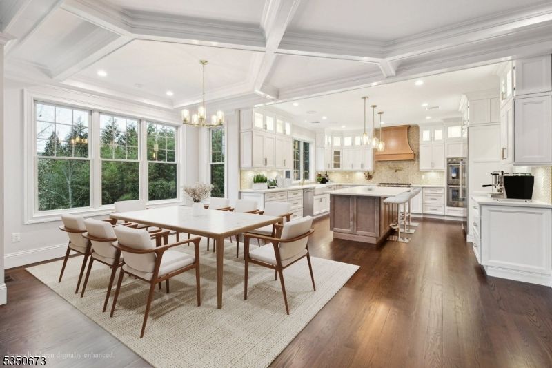 Chandelier, Dining room, Interior, Kitchen, Pendant Lights, Recessed Lighting, Stainless Steel Appliances, Wood Texture Flooring