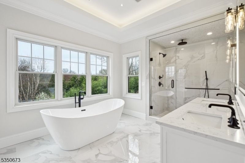 Bathroom, Dual Sink Vanities, Free Standing Baths, Glass Shower, Interior, Marble, Marble Walls, Recessed Lighting