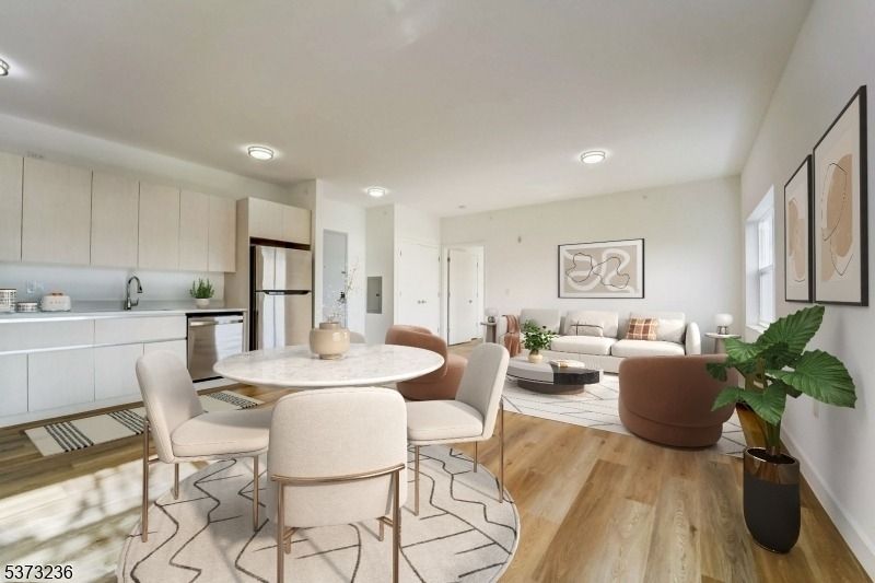 Dining room, Interior, Kitchen, Living room, Recessed Lighting, Stainless Steel Appliances, Wood Texture Flooring