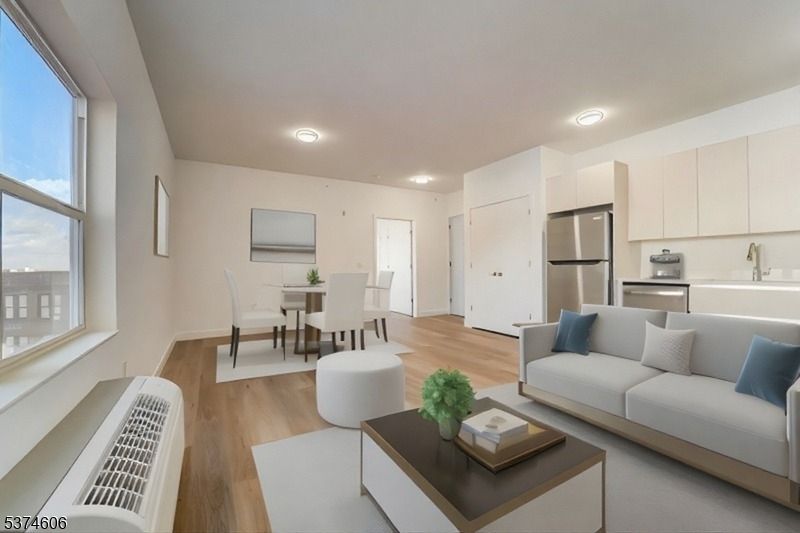 Dining room, Interior, Kitchen, Living room, Recessed Lighting, Stainless Steel Appliances, Wood Texture Flooring