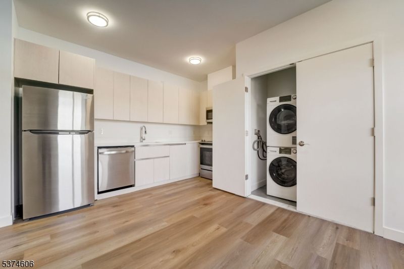 Interior, Kitchen, Stainless Steel Appliances, Utility Closets, Washer, Wood Texture Flooring