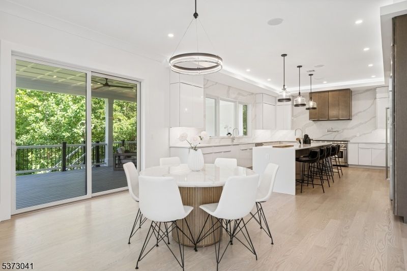Dining room, Interior, Kitchen, Marble Walls, Pendant Lights, Recessed Lighting, Wood Texture Flooring