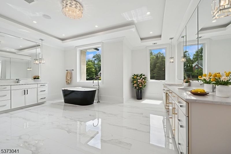 Bathroom, Chandelier, Dual Sink Vanities, Free Standing Baths, Interior, Marble, Pendant Lights, Recessed Lighting