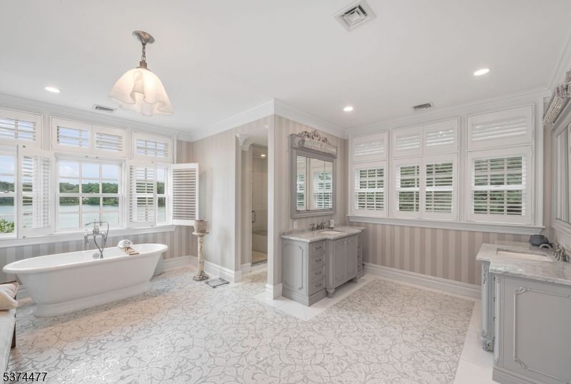 Bathroom, Free Standing Baths, Glass Shower, Interior, Pendant Lights, Recessed Lighting, Water