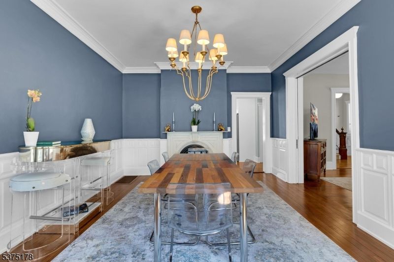 Chandelier, Dining room, Fireplace, Interior, Wood Texture Flooring