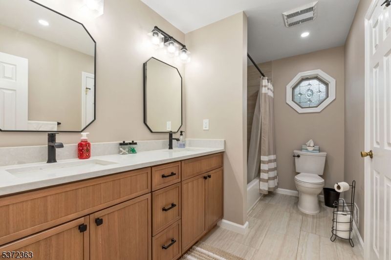 Bathroom, Dual Sink Vanities, Interior, Recessed Lighting, Wood Texture Flooring