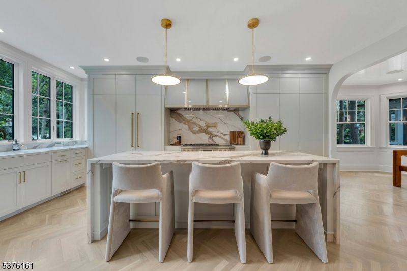 Interior, Kitchen, Marble Walls, Pendant Lights, Recessed Lighting, Wood Texture Flooring