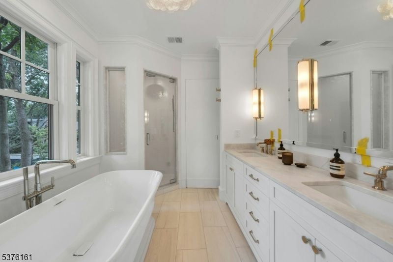 Bathroom, Dual Sink Vanities, Free Standing Baths, Interior, Wood Texture Flooring