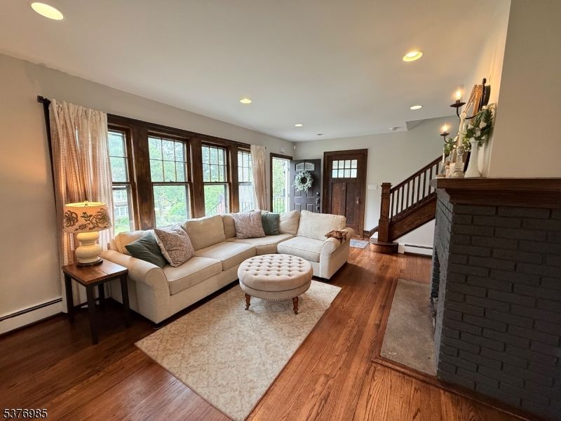 Fireplace, Interior, Living room, Recessed Lighting, Wood Texture Flooring