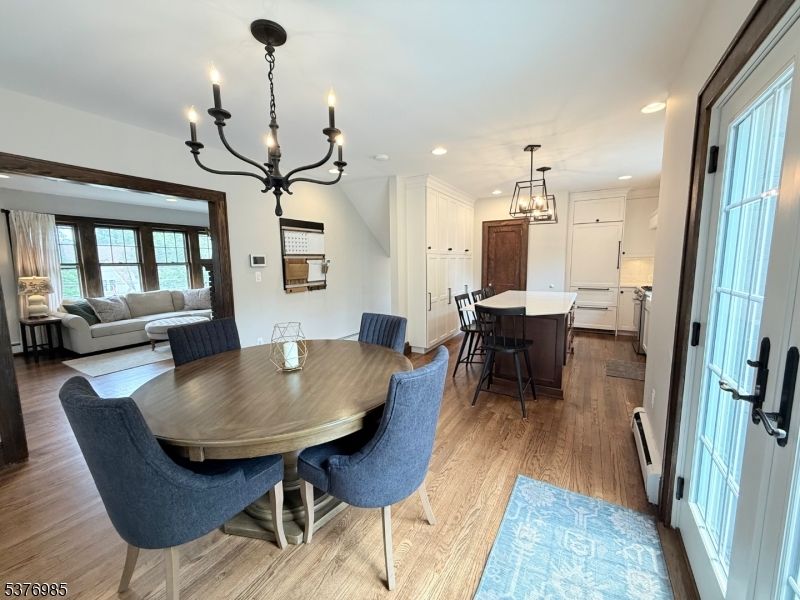 Chandelier, Dining room, Interior, Kitchen, Living room, Recessed Lighting, Wood Texture Flooring