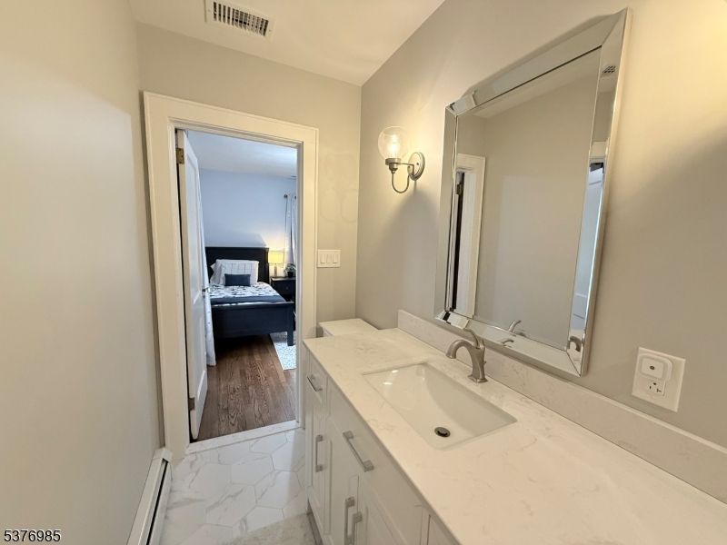 Bathroom, Bedroom, Dual Sink Vanities, Interior, Marble, Wood Texture Flooring