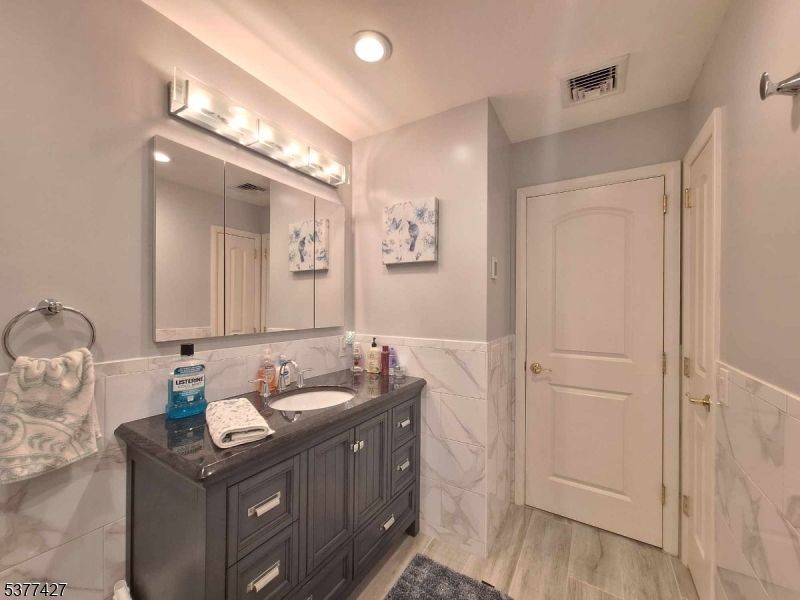 Bathroom, Interior, Marble Walls, Recessed Lighting, Wood Texture Flooring