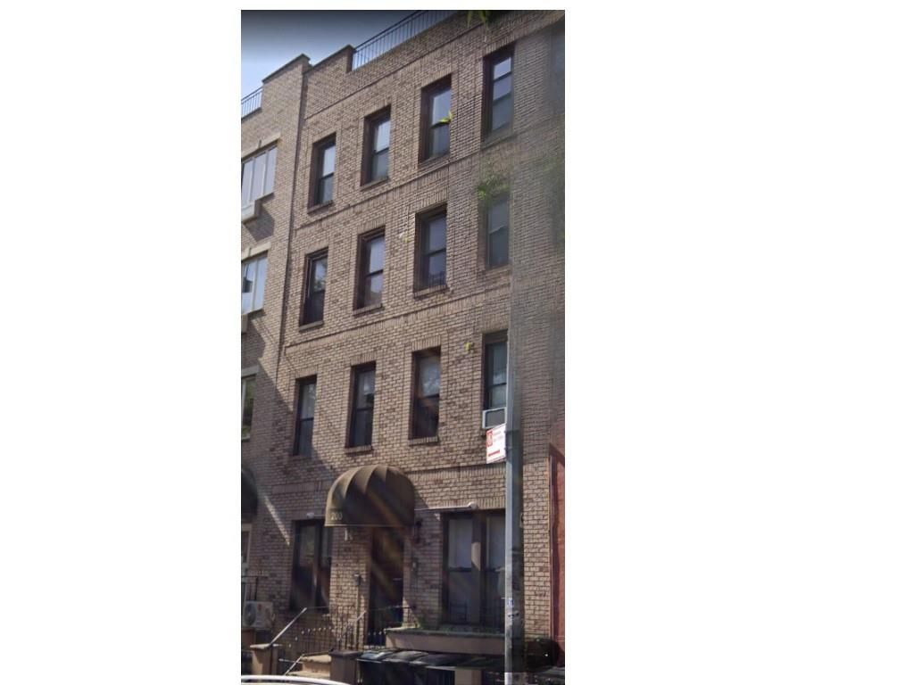 Exterior, Facade, Brick Facade, Condo Building