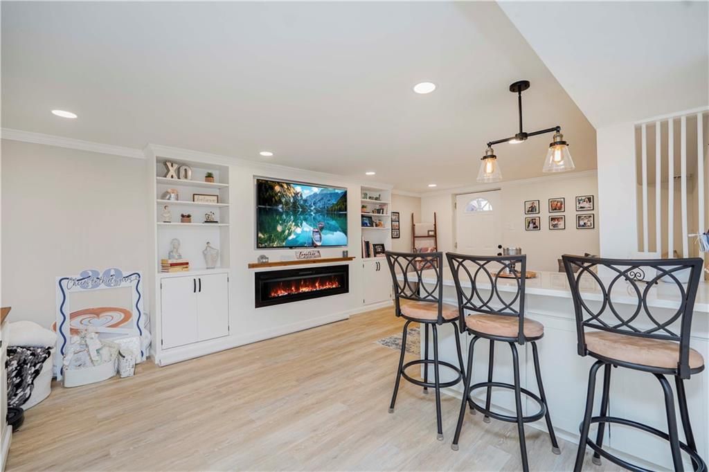 Fireplace, Interior, Pendant Lights, Recessed Lighting, Wood Texture Flooring