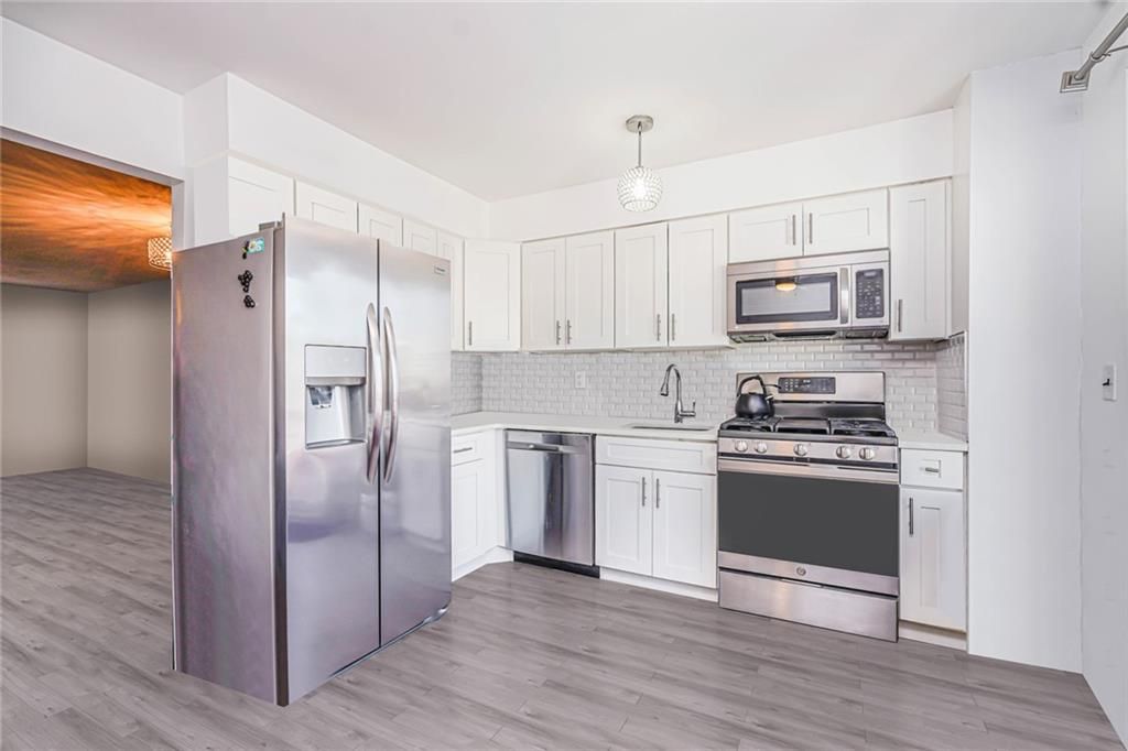Interior, Kitchen, Pendant Lights, Stainless Steel Appliances, Wood Texture Flooring