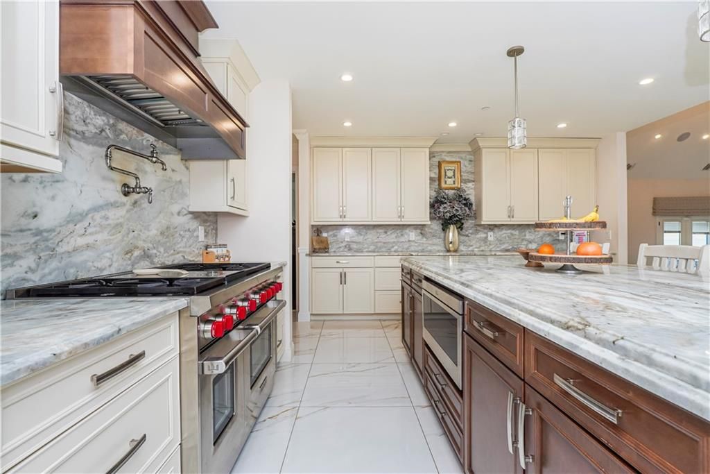 Interior, Kitchen, Marble, Marble Walls, Pendant Lights, Recessed Lighting, Stainless Steel Appliances