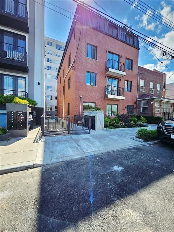Exterior, Facade, Brick Facade, Condo Building