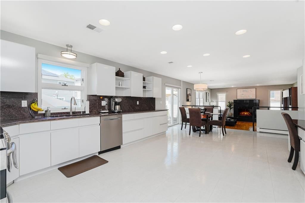 Dining room, Fireplace, Interior, Kitchen, Pendant Lights, Recessed Lighting, Stainless Steel Appliances