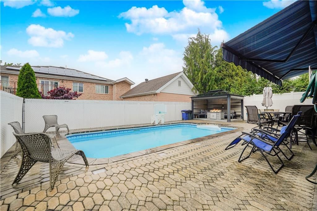 Exterior, Pool, Solar Panels