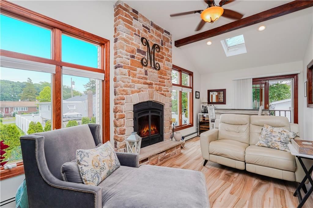 Fireplace, Interior, Living room, Recessed Lighting, Stone Walls, Wooden Beams, Wood Texture Flooring