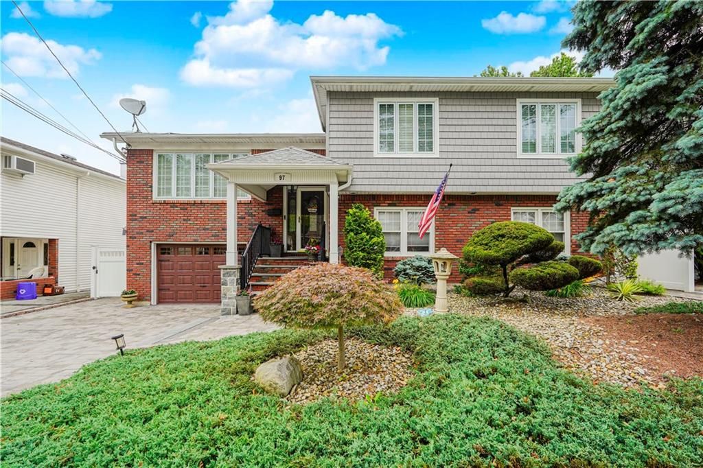 Attached, Exterior, Facade, Brick Facade, Raised Ranch