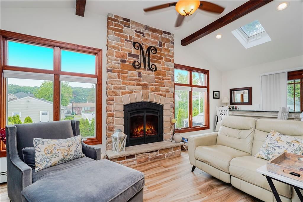 Fireplace, Interior, Living room, Recessed Lighting, Stone Walls, Wooden Beams, Wood Texture Flooring