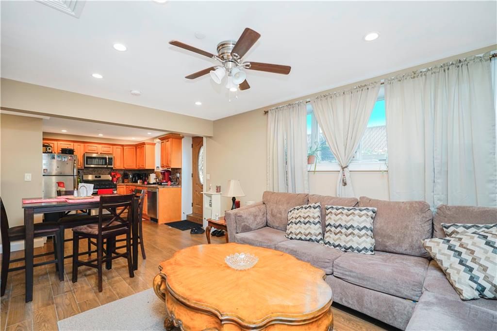 Dining room, Interior, Kitchen, Living room, Recessed Lighting, Stainless Steel Appliances, Wood Texture Flooring