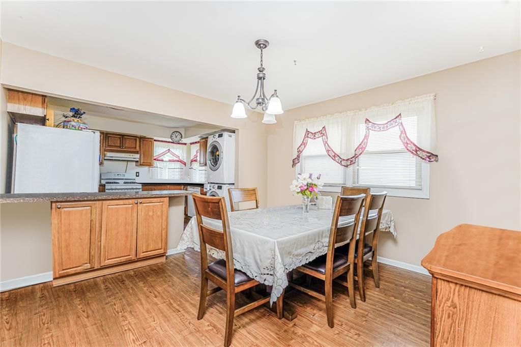 Dining room, Interior, Kitchen, Pendant Lights, Washer, Wood Texture Flooring
