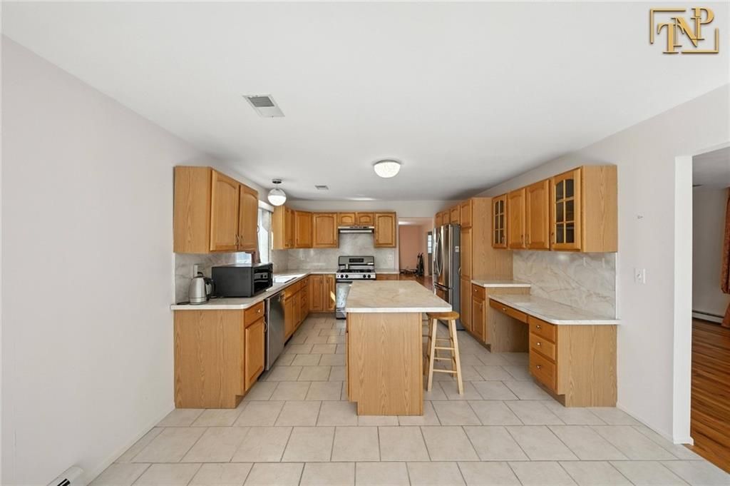 Interior, Kitchen, Marble Walls, Stainless Steel Appliances