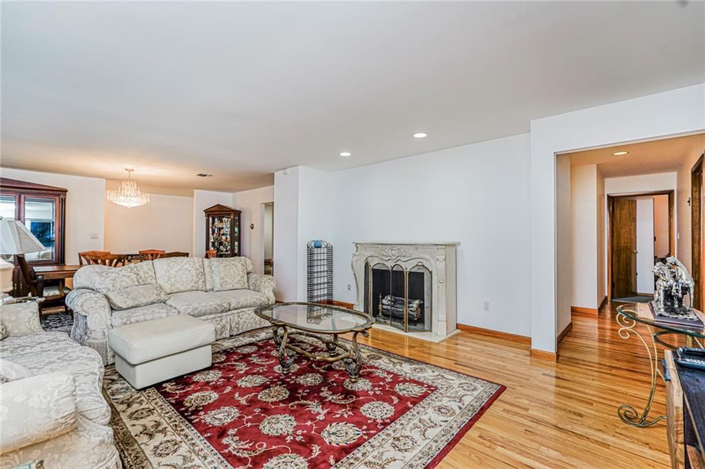 Chandelier, Dining room, Fireplace, Interior, Living room, Recessed Lighting, Wood Texture Flooring